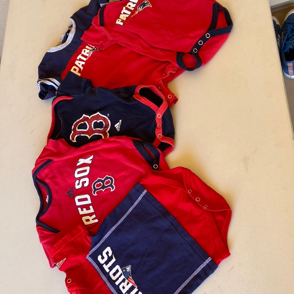 Boston fan baby onesies. Ranging from 3-18 months.